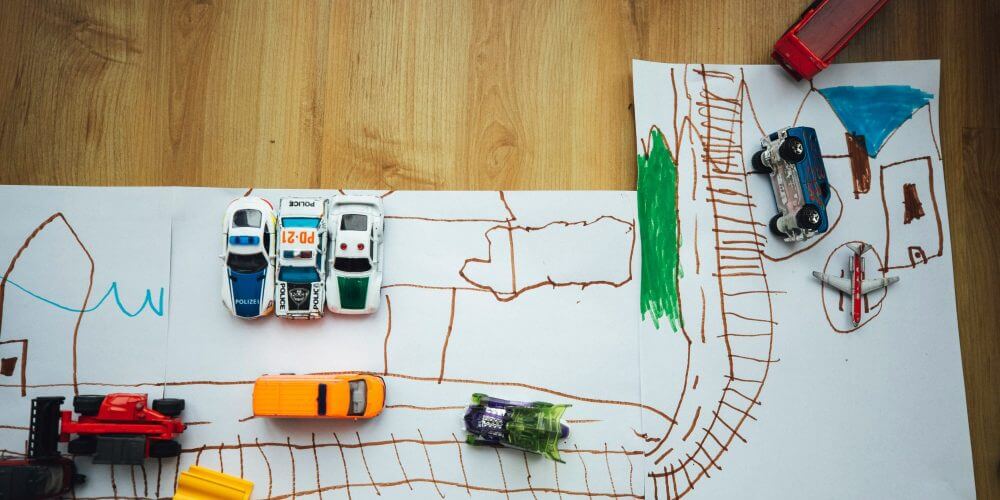 Child's game mapping roads and neighborhood
