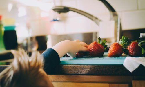 Just can’t keep his hands off when I’m washing fruit. :)