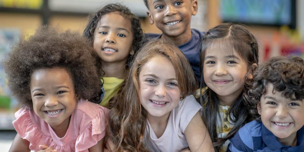Group of smiling children_iStock-1360291986