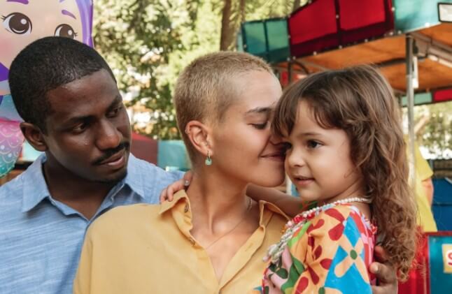 Man, woman and little girl